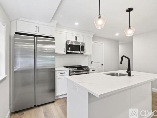6 BR, 4 BA Apartment 57 Nottinghill Road, Unit 2, Boston, MA 02135