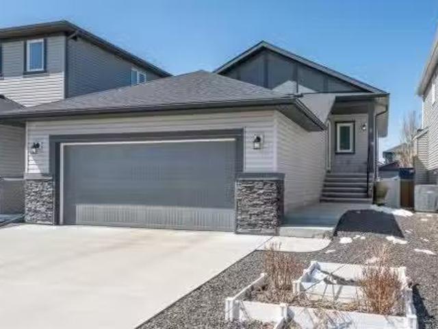 6 Drake Landing Grove, Okotoks, AB, T1S 0P6 house for sale.