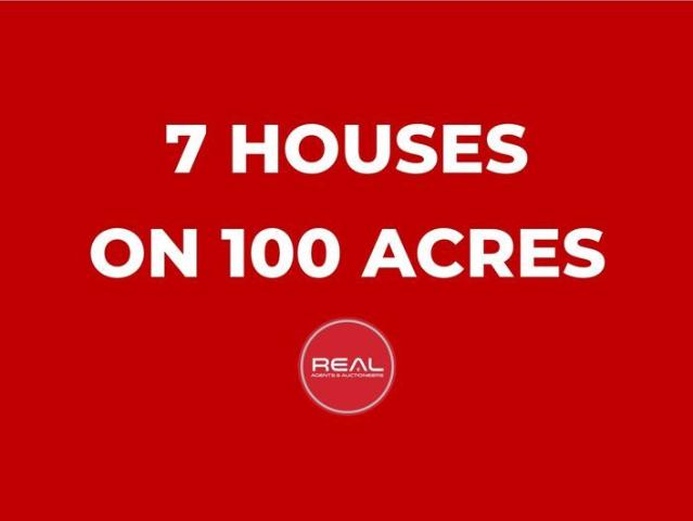 6 Fully renovated houses on 100 acres with various other buildings, Walk in walk out