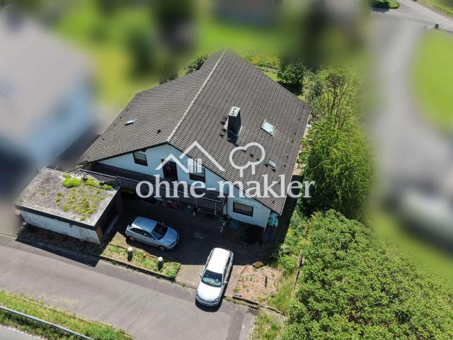 6,57 % Rendite, provisionsfrei! 2 bis 3 Familienhaus in erhöhter Lage mit Siegtalblick