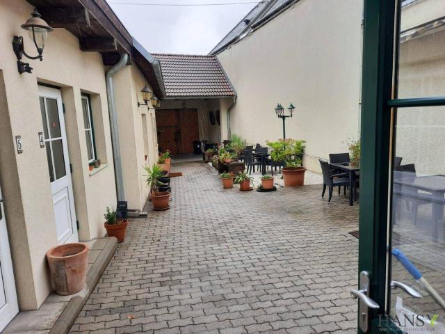 6,1% RENDITE: Zinshaus/ehemaliges Hotel mit 5 Apartments, 1 Gartenwohnung und Geschäftslokal PLUS Ausbaupotenzial!