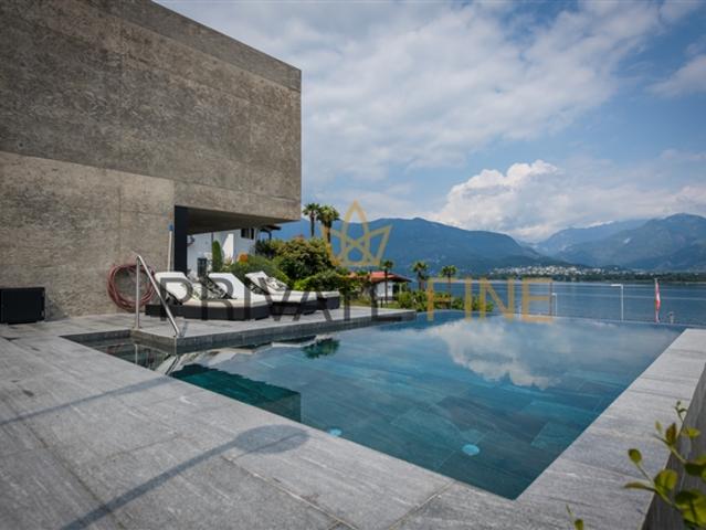 6.5 Zi. Traumvilla mit Seesicht und Pool 11