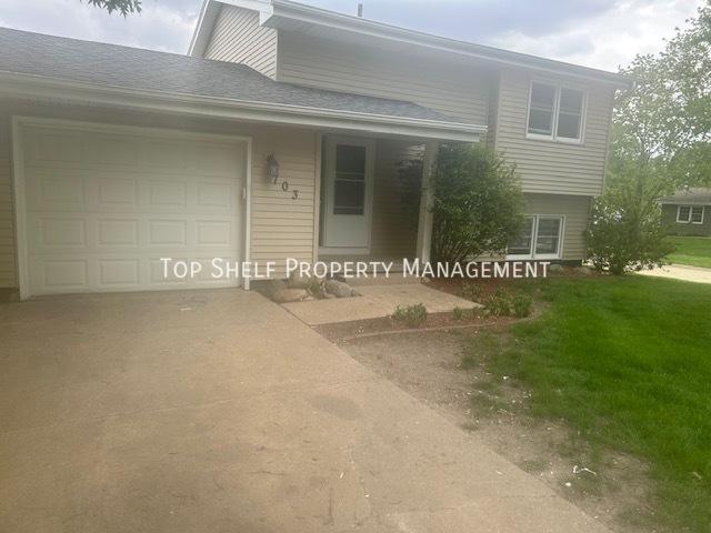 703 11th Ave NW, 3 beds, 1 full and 1 half bath