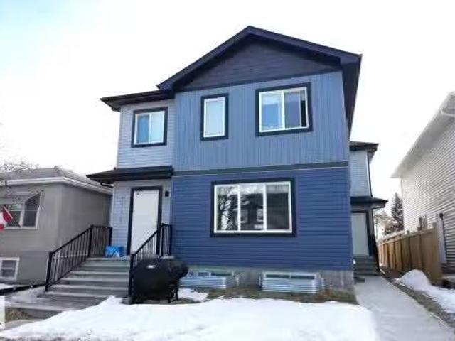 7113 / 7115 106 Street, Edmonton, AB, T6E 4V5 house for sale.