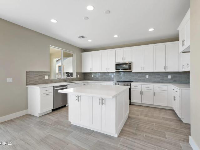 7351 E Louie Lane