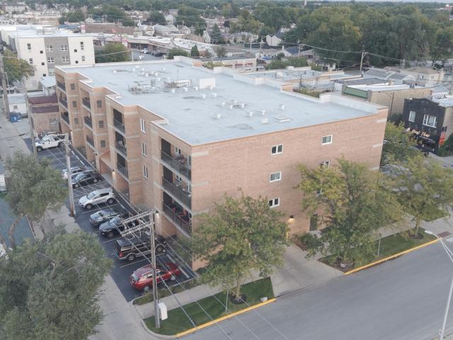 7414 W Irving Park Road # 202