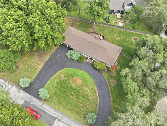 7417 NW Woody Creek Lane