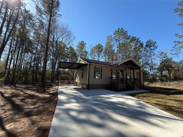 7926 Hawthorn, Plantersville, TX 77363 | MLS #48297