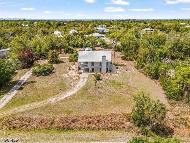 8677 Whispering Pines Dr, Saint James City, FL 33956