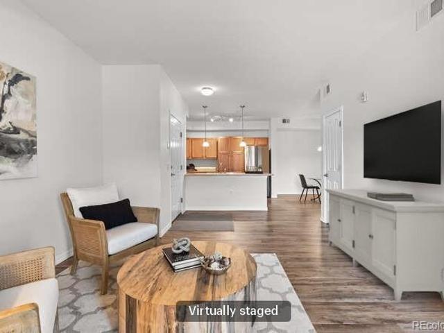 8778 S Kipling Way # 107
