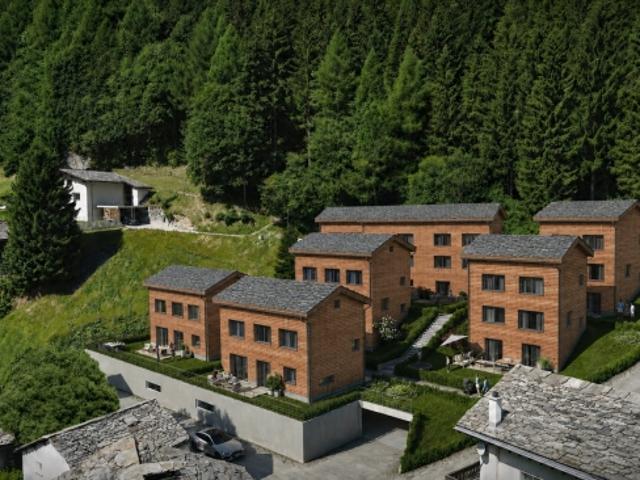 8 neue Einfamilienhäuser B5 für den Erstwohnsitz. Zeitgemässer Holzbau, sorgfältig geplant im kleinen Ensemble Bim Chrützchappeli