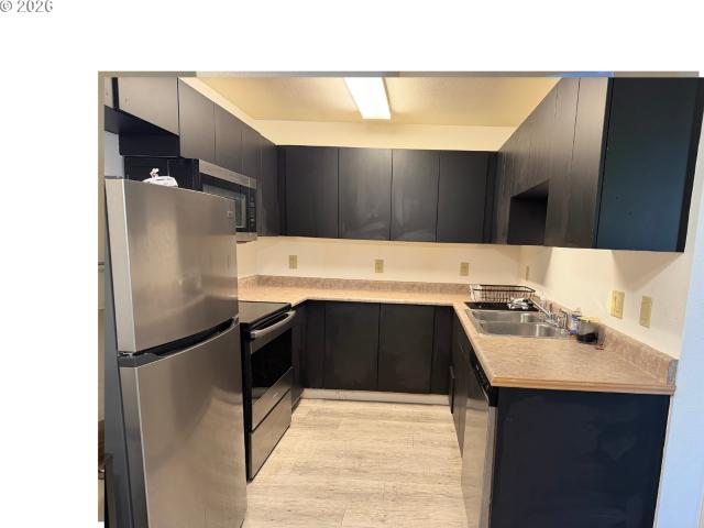 9230 se division st # 206