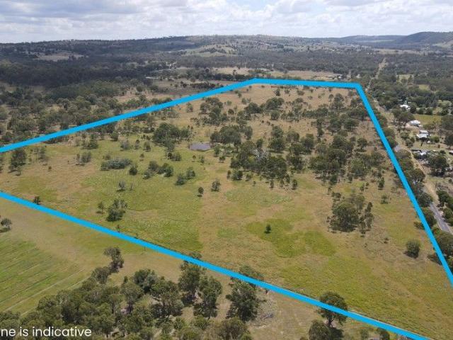94 ACRES WITH A ONE KILOMETER FRONTAGE ALONG THE NEW ENGLAND HWY
