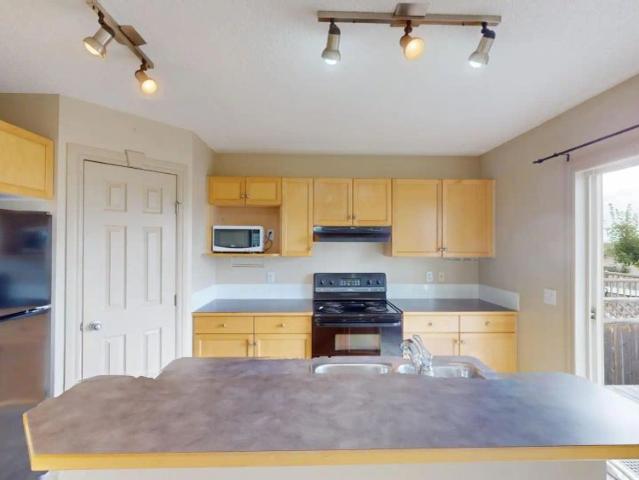 95 Arbour Meadows Close NW — 3 Bedrooms