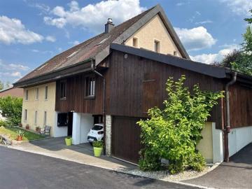 9,5 Zimmer Haus zum Verkauf im Dorf Courtételle