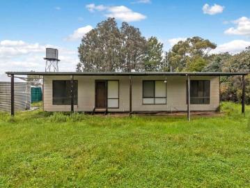 13.5 Acres with Three Bedroom Home