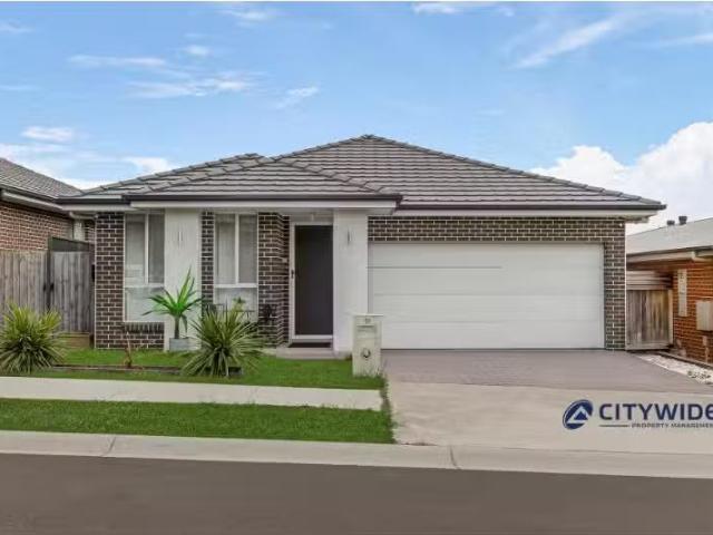 13 Ducros St, Oran Park NSW 2570 House for rent Listed by Owe.