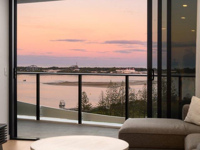 13th Floor Near New 2 Bed, 2 Bath, 2 Car Apartment with Sweeping Broadwater Outlook