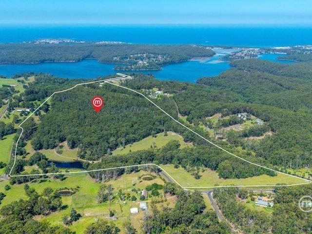 100 acres, lake frontage PLUS an airfield!
