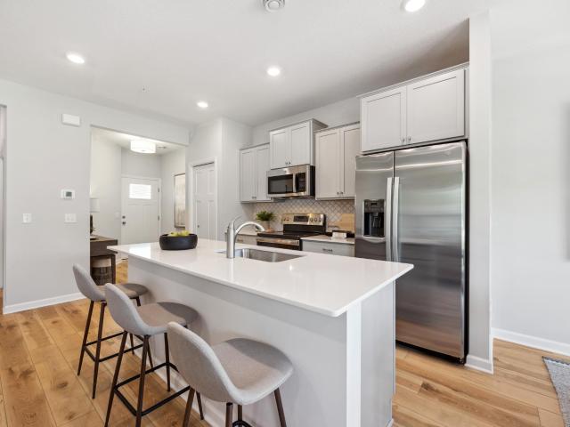 1036 th Court E