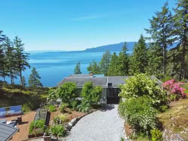 10991 10993 Sunshine Coast Highway, Halfmoon Bay, BC, V7Z 1B8.