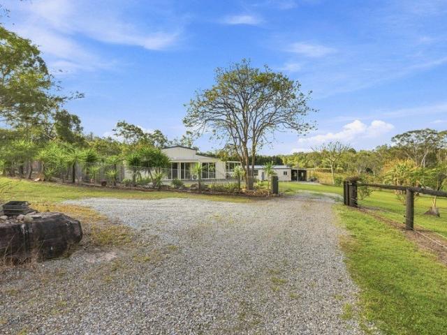 10.7 Acres, Potential for Dual Living and backing onto Scrubby Creek