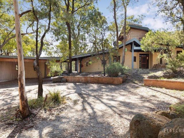 10 acre artistic sanctuary with an architect designed home, cottage & studio