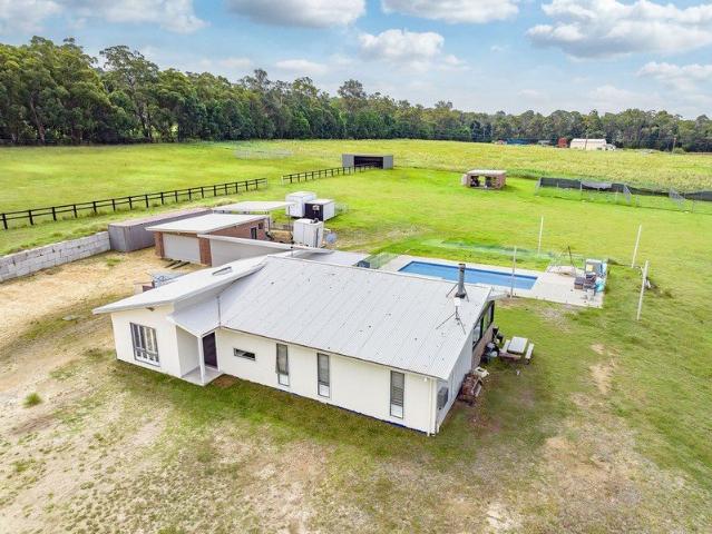 10 Acre* Corner Parcel with Modern Family Home
