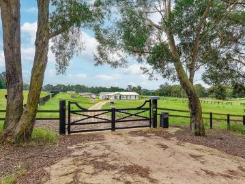 10 Acre* Corner Parcel with Modern Family Home