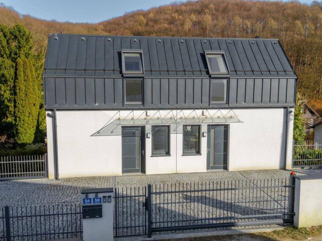 LETZTE EINHEIT! 10 Minuten zum Auhof Center! ERSTBEZUG! Doppelhaushälfte mit 170 m2 Wohnfläche in ruhiger Wohnlage mit Grünblick!
