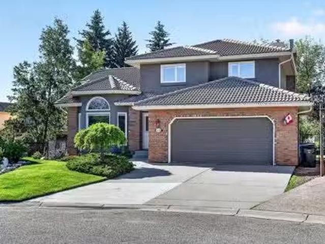 115 Woodpark Terrace Sw, Calgary, AB, T2W 6E7 house for sale.