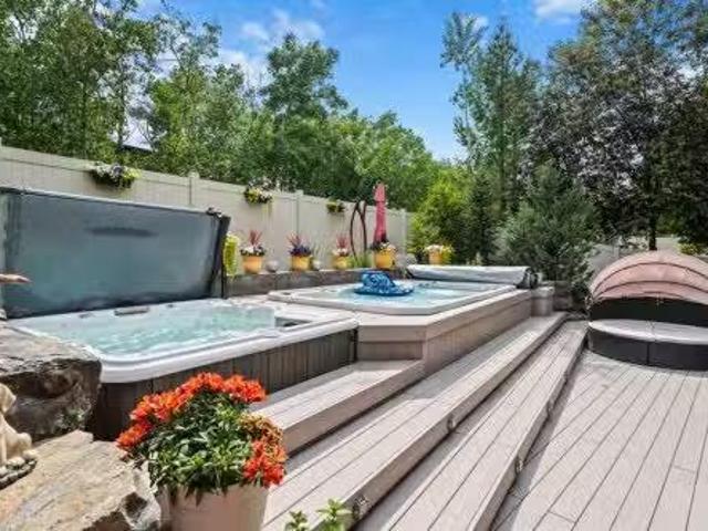 11 Aspen Cliff Place Sw, Calgary, AB, T3H 0M1 house for sale.