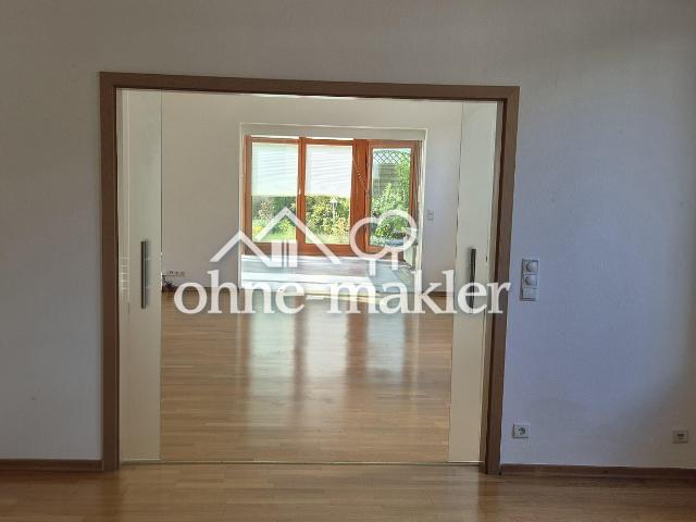 120 m² mit beheiztem Wintergarten, Terrasse & Garten – außergewöhnliche Wohnung in Schleswig