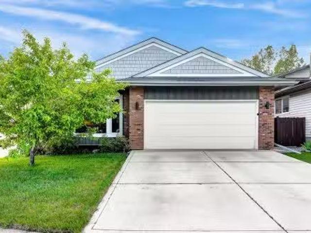 120 Woodbrook Close Sw, Calgary, AB, T2W 4E9 house for sale.