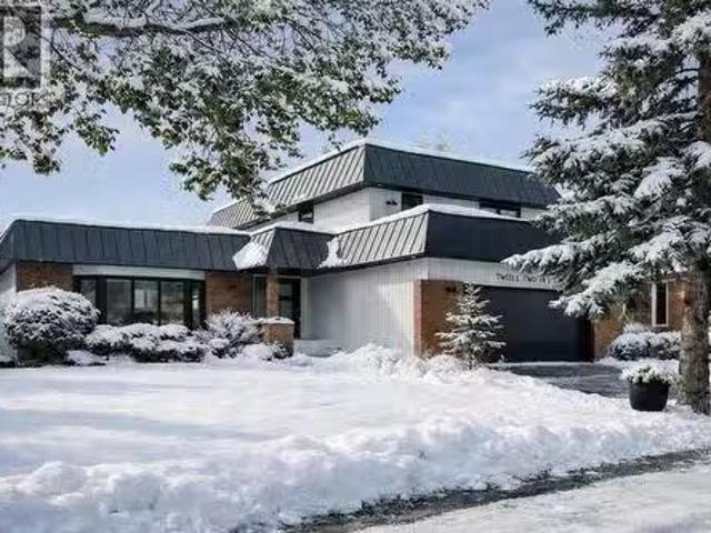 12215 Lake Erie Way Se, Calgary, AB, T2J 2L9 house for sale.