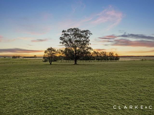 12.04 ACRES OF IMPRESSIVE ACREAGE LIVING WITH STUNNING VIEWS!
