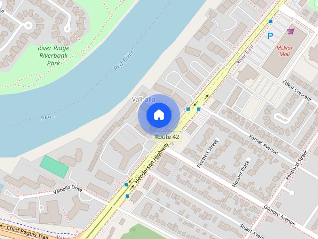 12 floor concrete apartment building located riverside in North Kildonan on Henderson Hwy