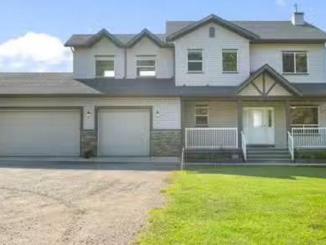 13003 Township Road 265, Rural Rocky View County, AB, T4B 2Z8.