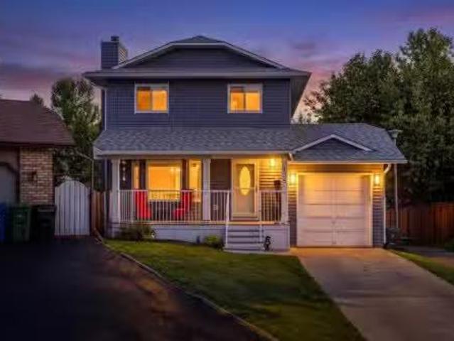 135 Sandarac Place Nw, Calgary, AB, T3K 2Y6 house for sale.