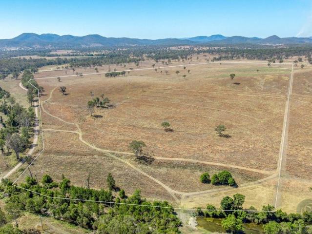 140 Acres of Rural Opportunity with Expansive Country Views