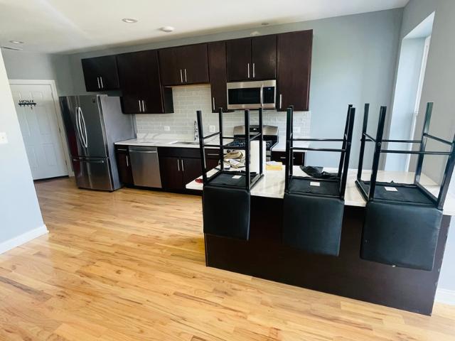 1411 E 67th Place # 3E