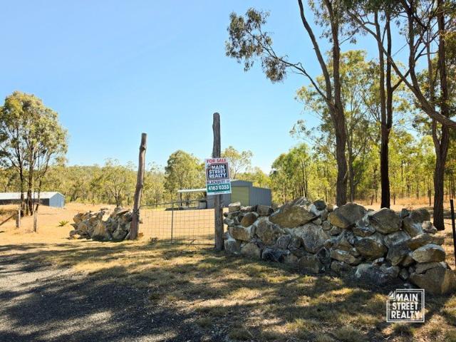 14.58 ACRES, SUBSTANTIAL SHEDDING & CREEK JUST 12 MINS FROM BLACKBUTT