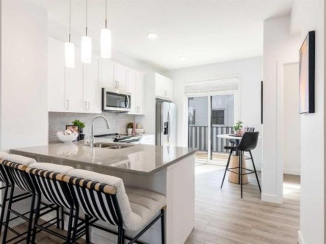 1506 Rangeview Drive Se, Calgary, AB, T3S 1H2 townhouse for sale | Listing ID A2354 | Royal LePage