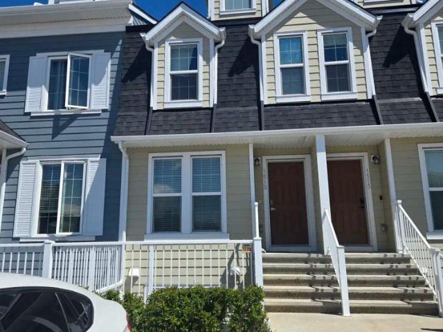 1512, 2400 Ravenswood View SE — 2 Bedroom Townhouse
