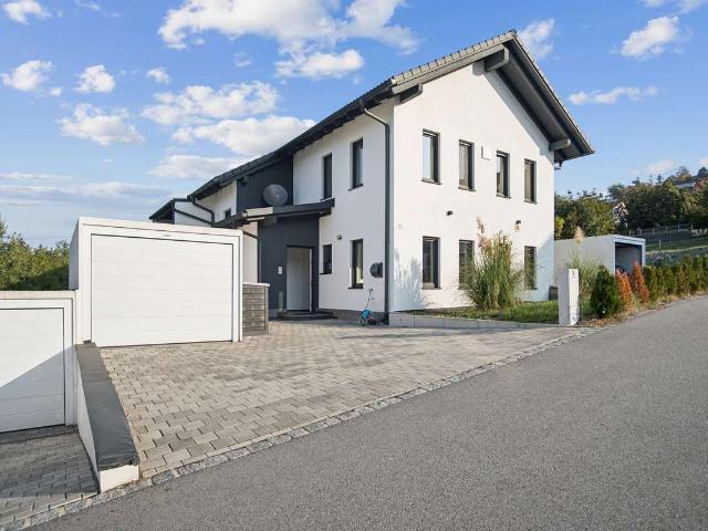 152 m² mit Hauscharakter – KfW 55, Garten, Garage & Keller
