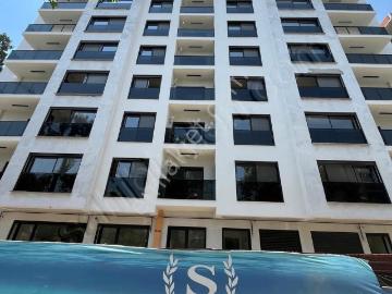 15 Bayraklı Mansuroğlunda Modern Yapılı 2+1 Satılık Daire