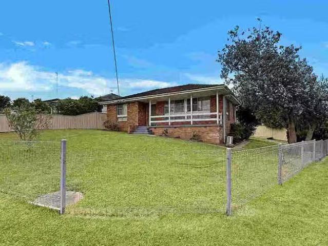15 Garrard Avenue, Mount Warrigal, NSW 2528