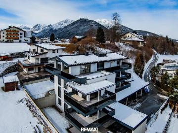 15 Minuten von Innsbruck: Prächtige 3 Zimmer Neubauwohnung mit 90 m² großem Garten und Terrasse