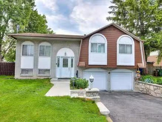 15 Rue Ash, Dollard Des Ormeaux, QC, H9B 1J8 house for sale.