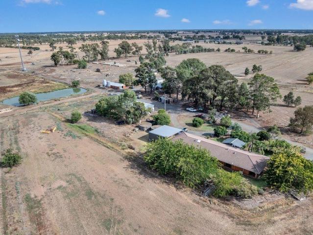 161 Acres with Spacious Brick Home & Development Potential STCA